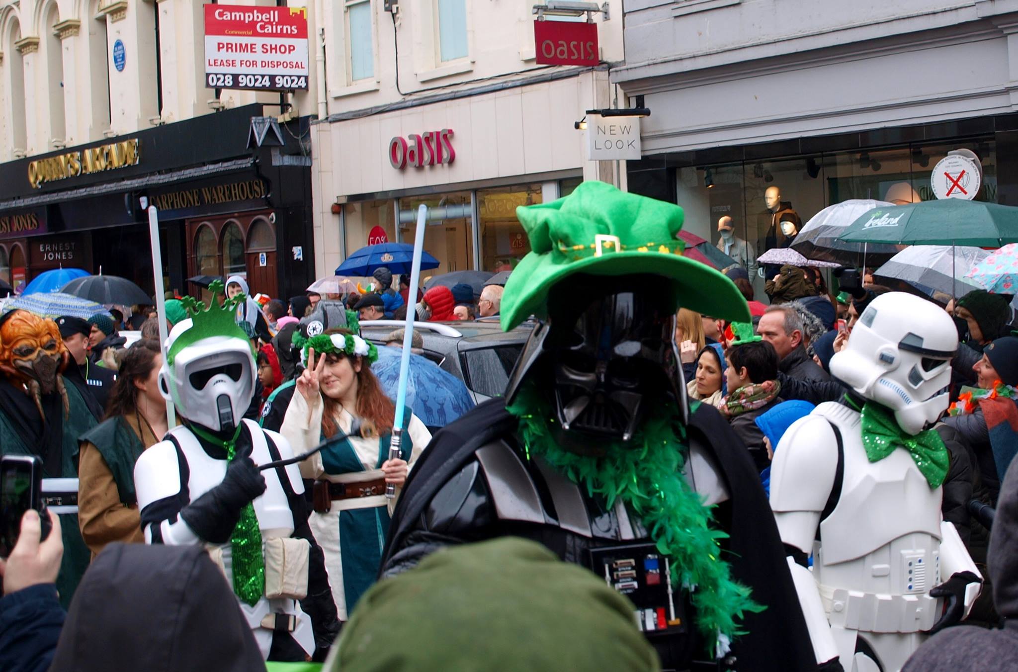 Darth Vader on a green hat and feather boa because why not?